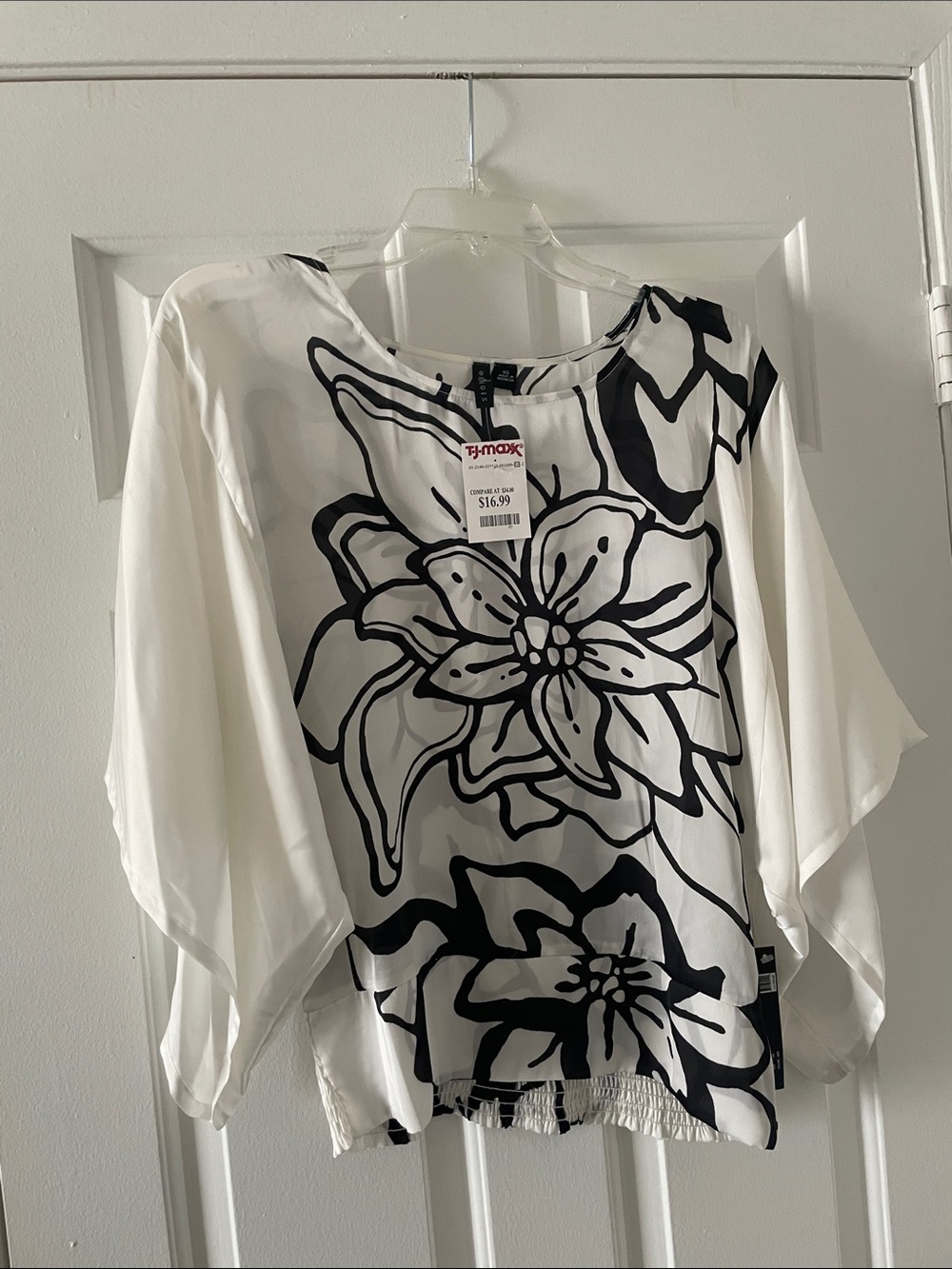 Sioni White Blouse with Bold Black Floral Print